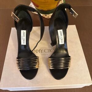 Jimmy Choo Black and Gold Strappy Heels